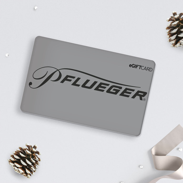 Pflueger eGift card on white background with holiday accents of pinecones and ribbons 